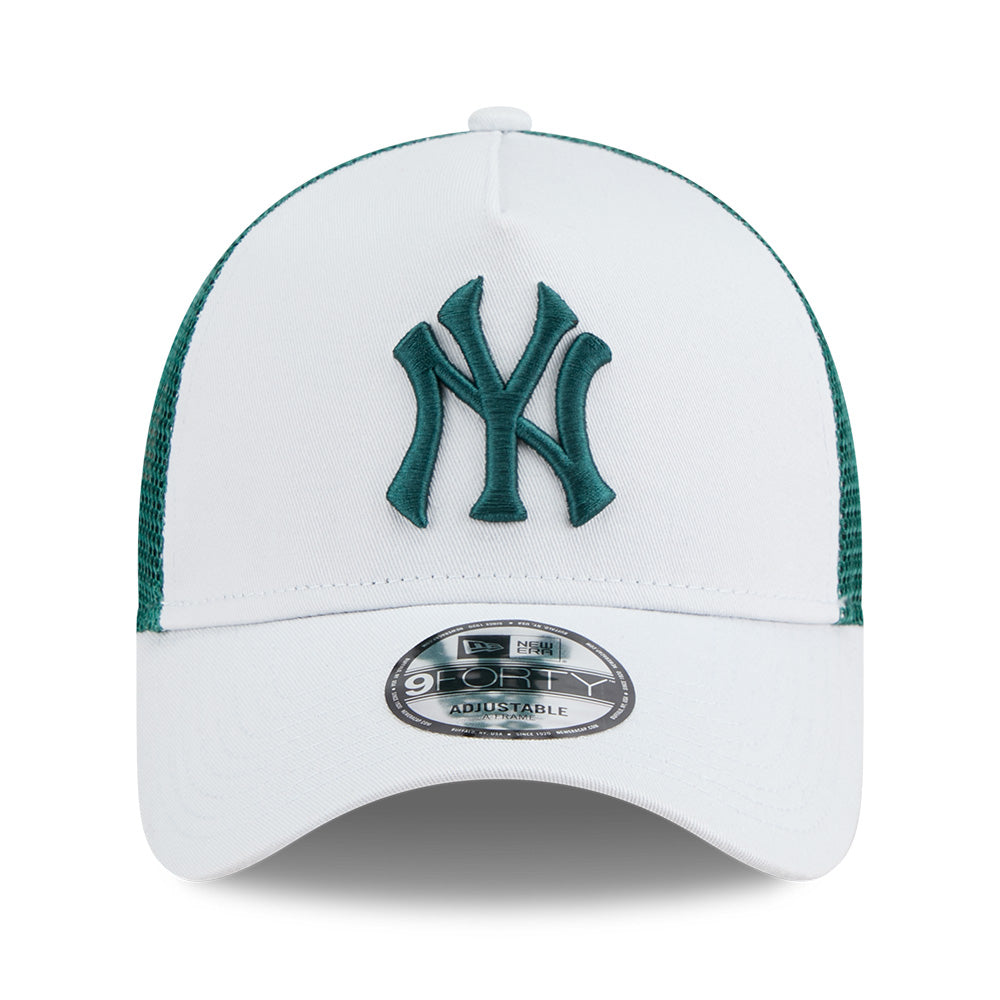White and green baseball cap with a logo on a white background