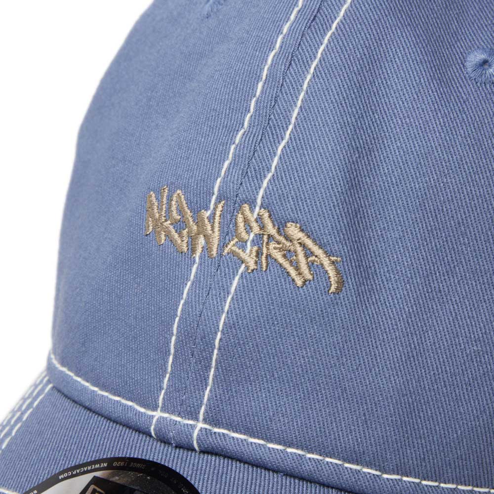 New Era Tagging Mini Logo Blue 9TWENTY Trucker Adjustable Cap