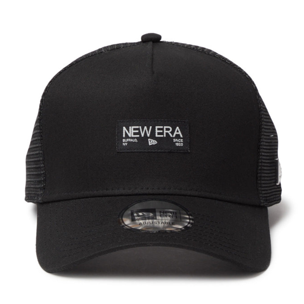 New Era Silver Wordmark Metal Flag Black 9FORTY A-Frame Trucker Snapback Cap