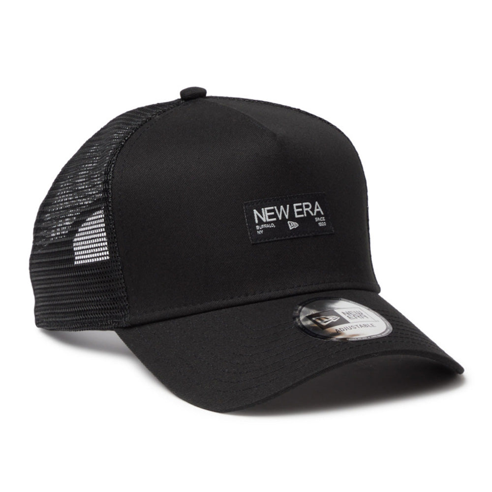 New Era Silver Wordmark Metal Flag Black 9FORTY A-Frame Trucker Snapback Cap