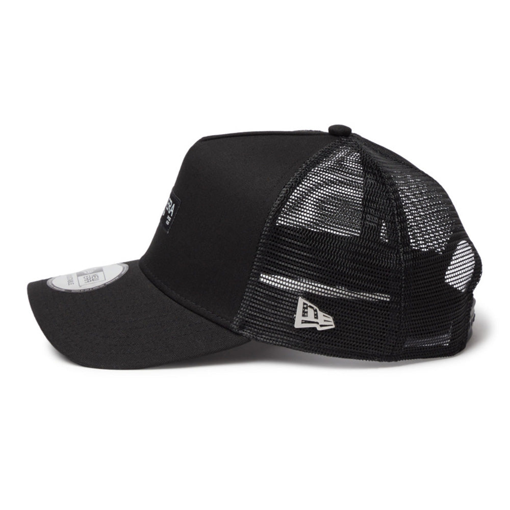 New Era Silver Wordmark Metal Flag Black 9FORTY A-Frame Trucker Snapback Cap