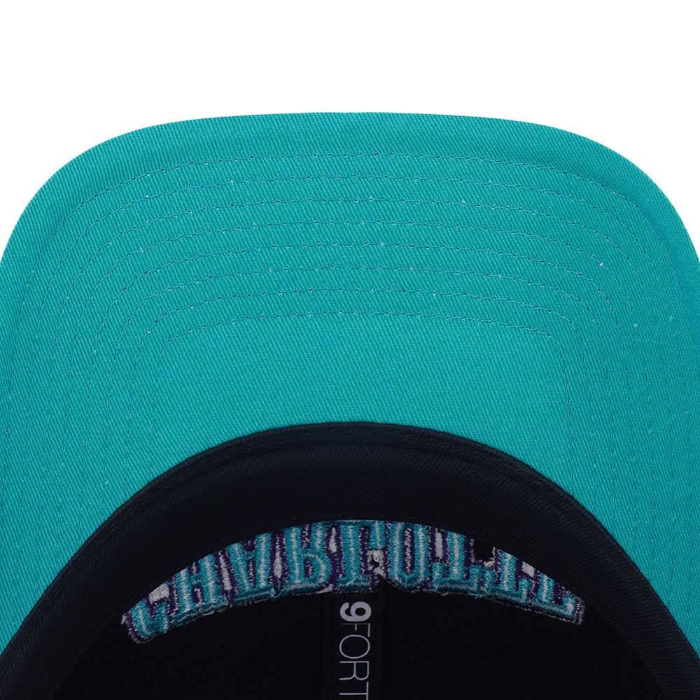 New Era Charlotte Hornets Hardwood Classics 2026 Black Teal 9FORTY Unstructured Adjustable Cap