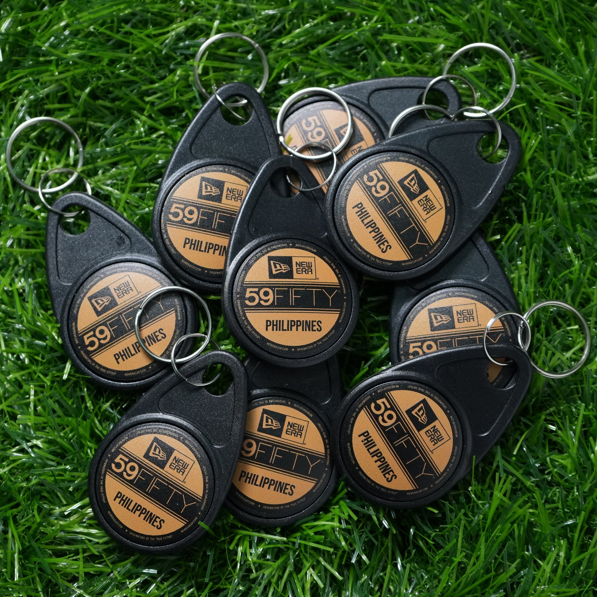 New Era Keyfob Brass Logo Black